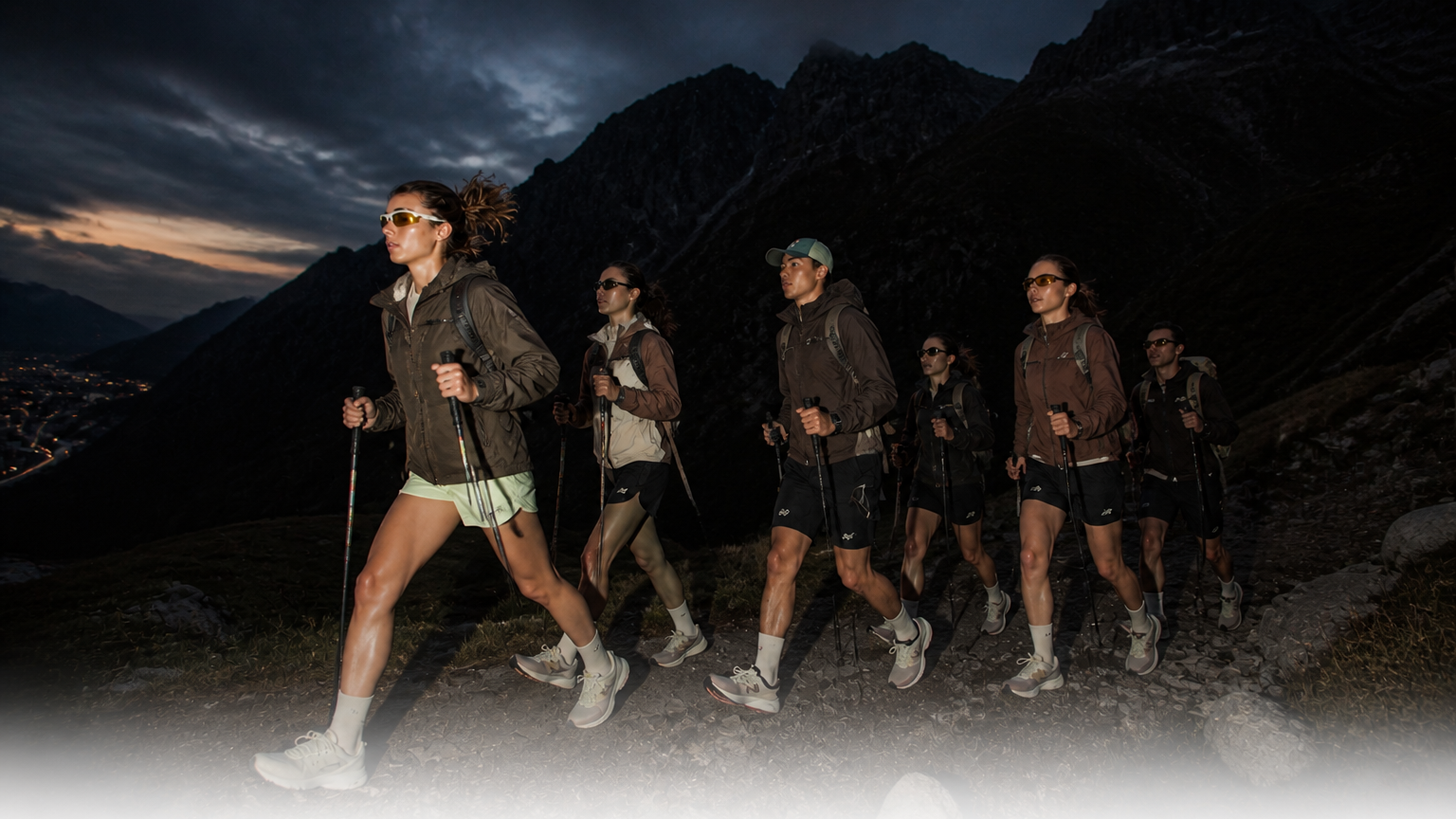 Hikers heading into the mountains at dusk